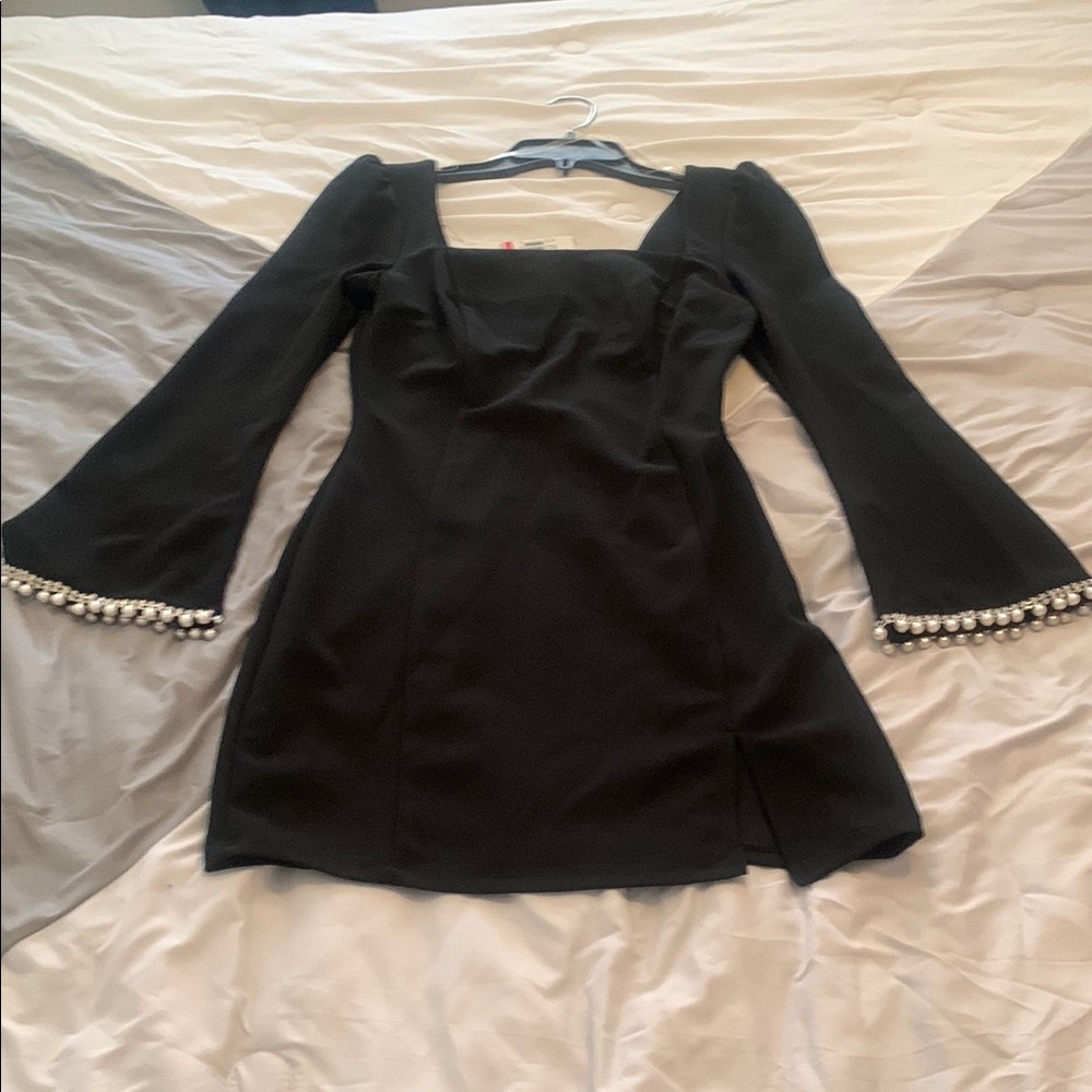 Elegant Black Dress with Pearl Accents